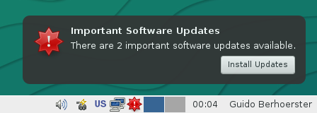 Screenshot of pk-update-icon desktop notification and tray icon notifying
about available package updates